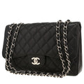 Chanel Timeless Jumbo shoulder bag in black quilted grained leather