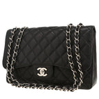 Chanel Timeless Jumbo shoulder bag in black quilted grained leather