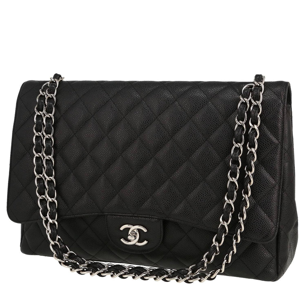 Chanel Timeless Maxi Jumbo handbag in black quilted grained leather