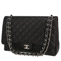 Chanel Timeless Maxi Jumbo handbag in black quilted grained leather