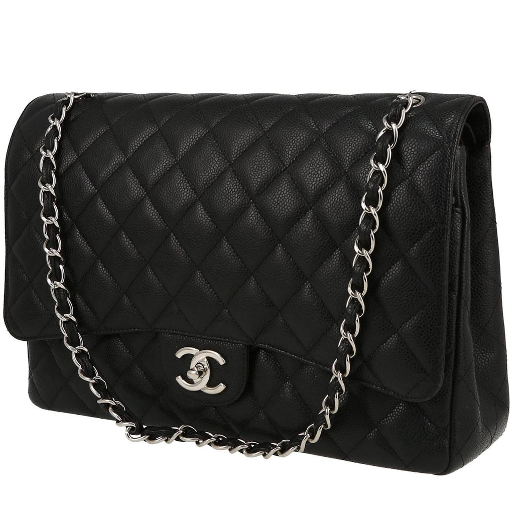 Chanel Timeless Maxi Jumbo handbag in black quilted grained leather