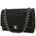 Chanel Timeless Maxi Jumbo handbag in black quilted leather