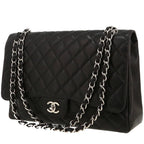 Chanel Timeless Maxi Jumbo handbag in black quilted grained leather