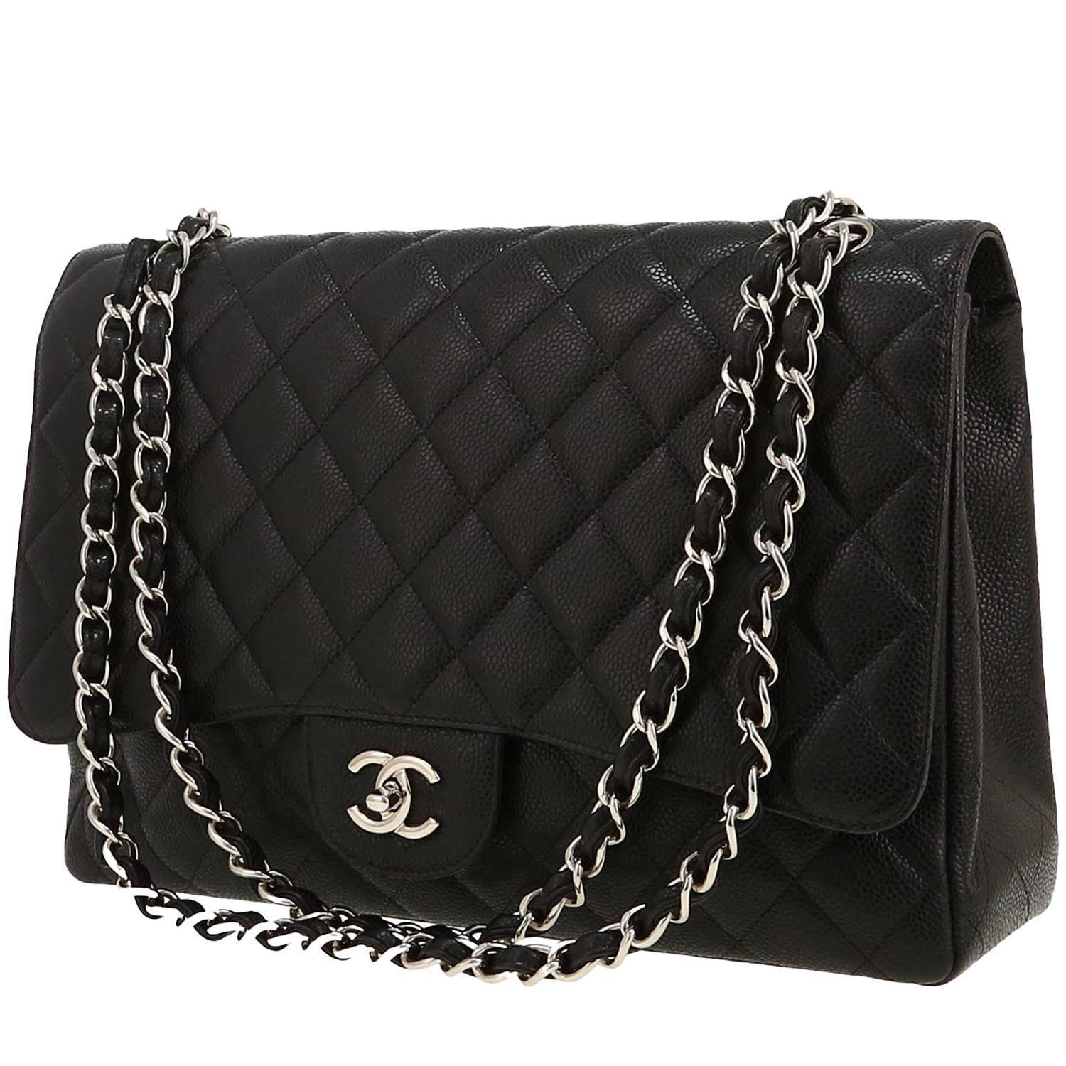 Chanel Timeless Maxi Jumbo handbag in black quilted grained leather