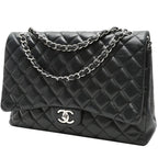 Chanel Timeless Maxi Jumbo handbag in black quilted leather