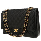Chanel Timeless Maxi Jumbo handbag in black quilted leather