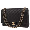 Chanel Timeless Maxi Jumbo shoulder bag in black quilted grained leather