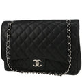 Chanel Timeless Maxi Jumbo shoulder bag in black quilted grained leather