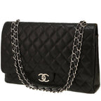 Chanel Timeless Maxi Jumbo shoulder bag in black quilted grained leather