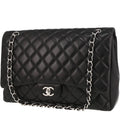 Chanel Timeless Maxi Jumbo shoulder bag in black quilted leather