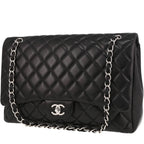 Chanel Timeless Maxi Jumbo shoulder bag in black quilted leather