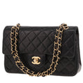 Chanel Timeless Petit handbag in black quilted leather