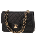Chanel Timeless Petit handbag in black quilted leather