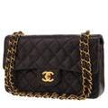 Chanel Timeless Petit handbag in black quilted leather