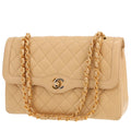 Chanel Timeless Vintage handbag in beige quilted leather