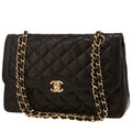 Chanel Timeless Vintage handbag in black quilted leather