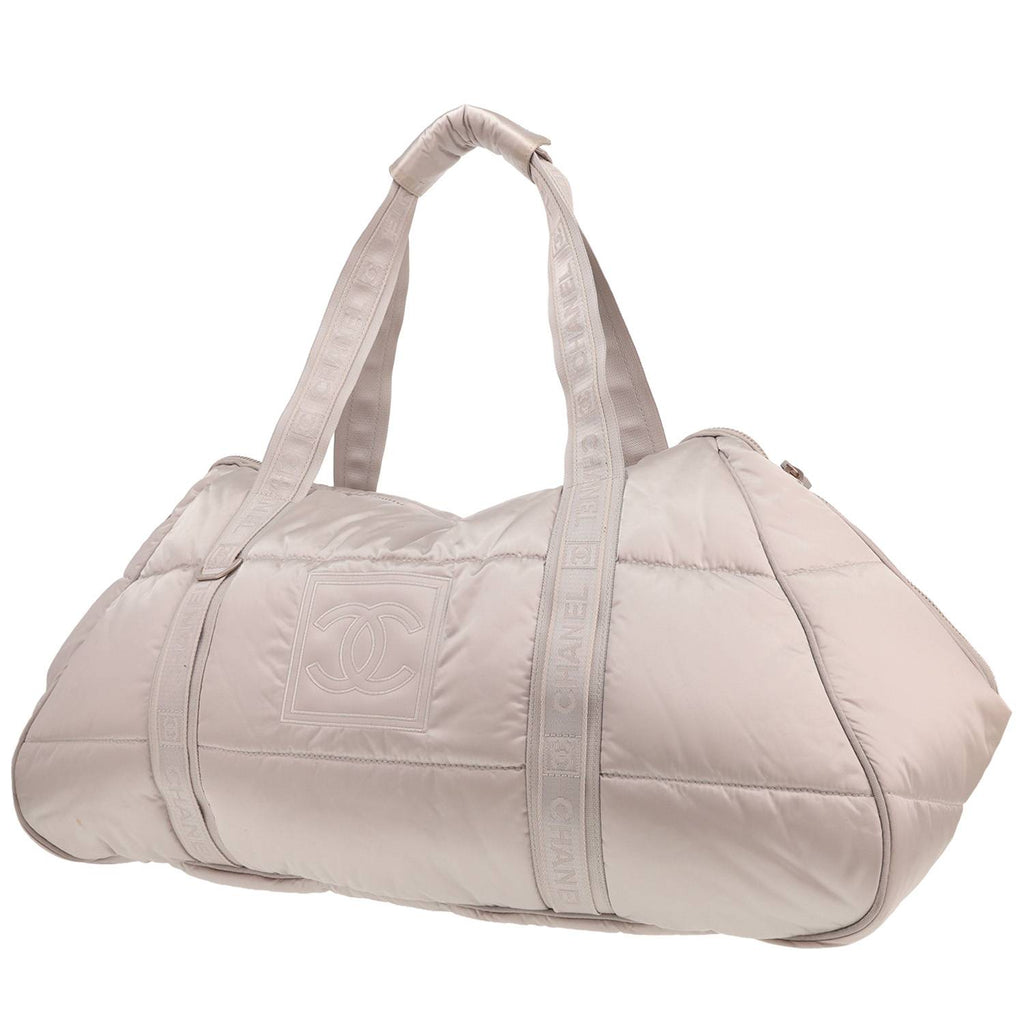 Chanel travel bag in silver canvas