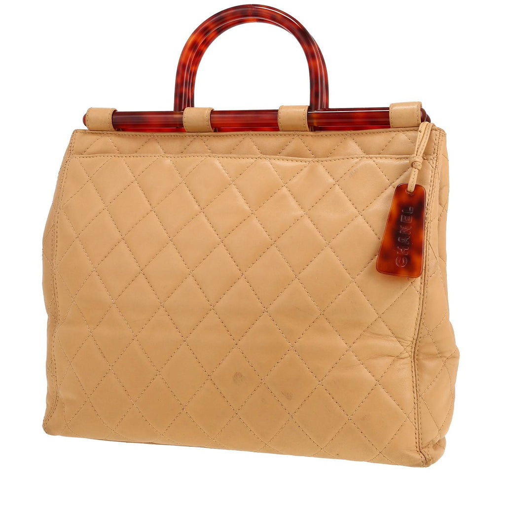 Chanel Vintage shopping bag in beige quilted leather