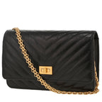 Chanel Wallet on Chain shoulder bag in black chevron quilted leather