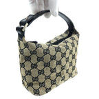 GUCCI MONOGRAM CLUTCH BAG
