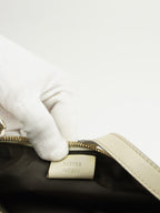 GUCCI MONOGRAM BAG WITH HEART CHARM