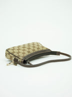 GUCCI MONOGRAM BAG WITH CHARM