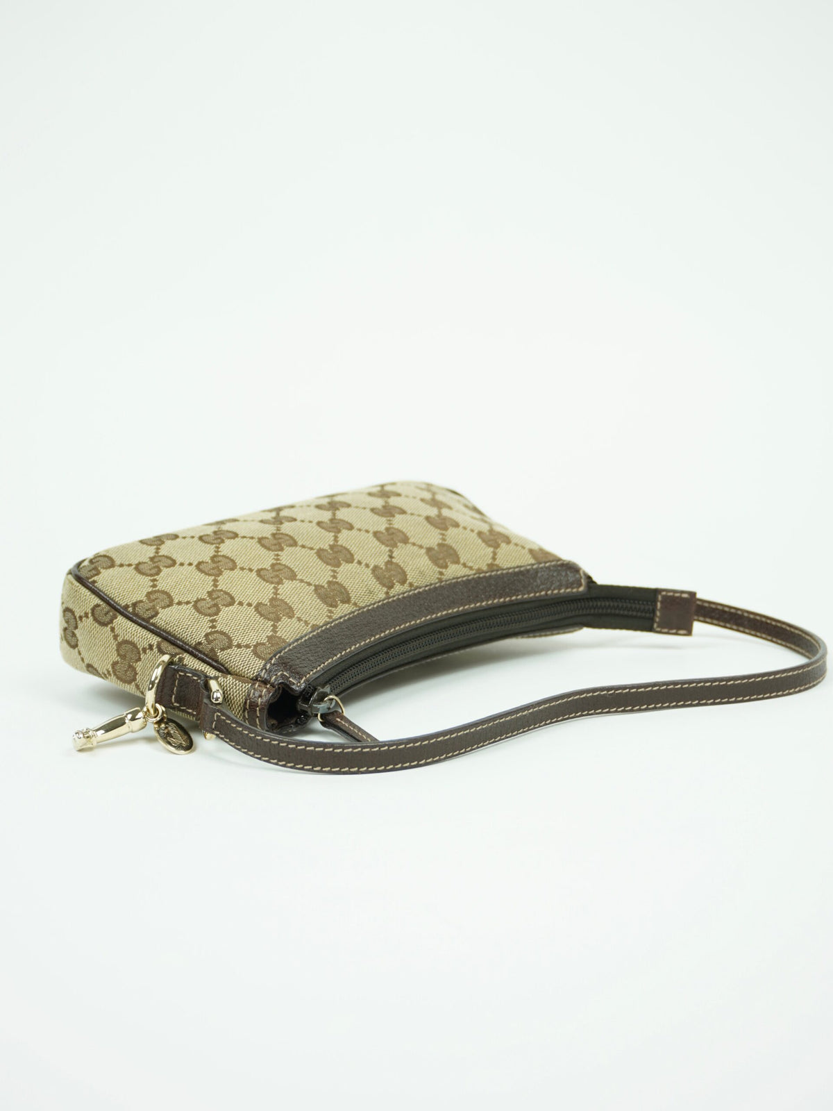 GUCCI MONOGRAM BAG WITH CHARM