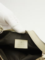GUCCI MONOGRAM BAG WITH HEART CHARM
