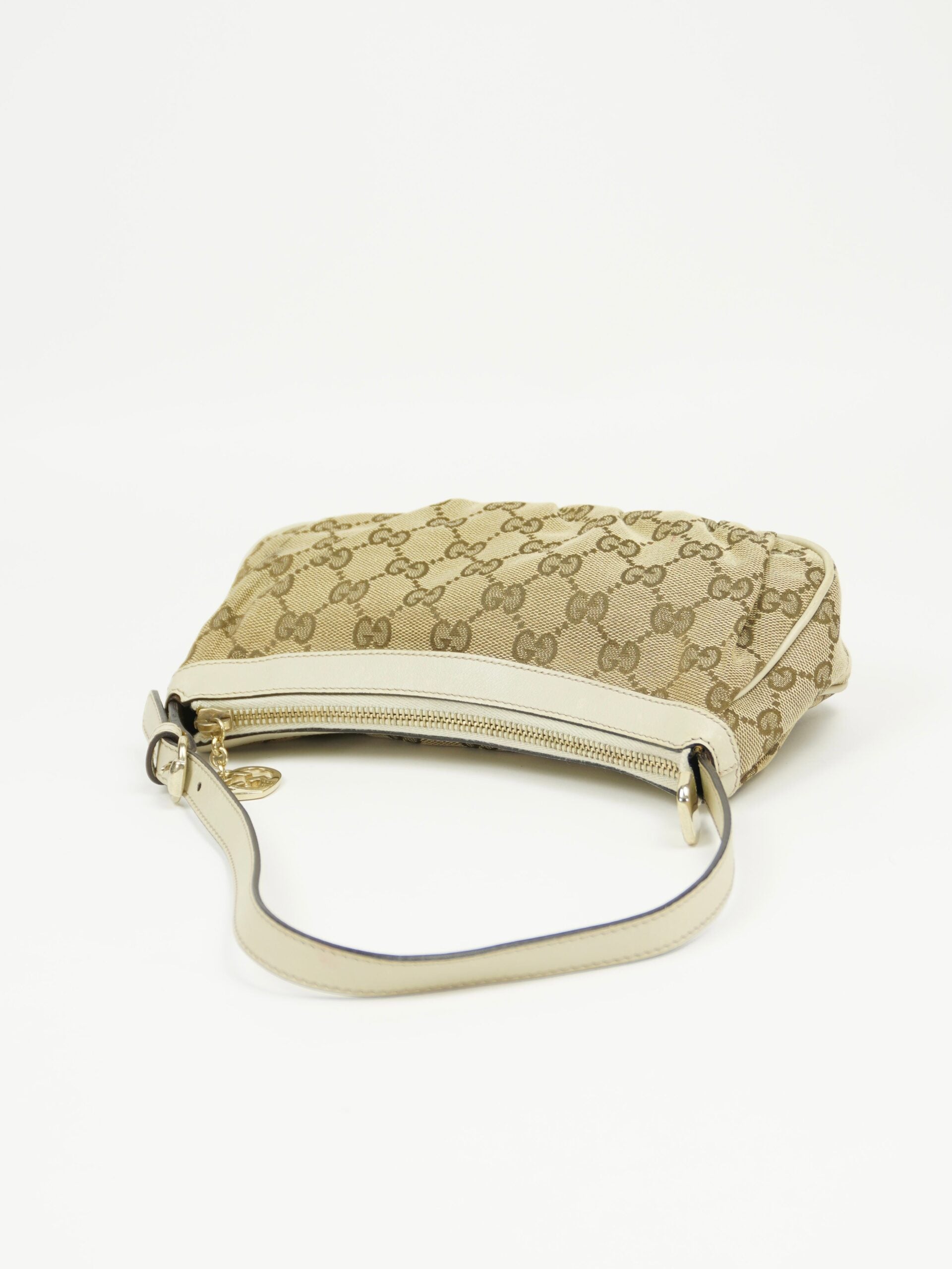 GUCCI MONOGRAM BAG WITH HEART CHARM