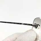 CHANEL RIMLESS SUNGLASSES