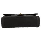 Chanel Timeless Maxi Jumbo handbag in black quilted grained leather - DETAIL 1