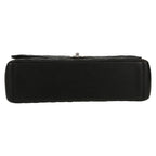 Chanel Timeless Maxi Jumbo handbag in black quilted grained leather - DETAIL 1