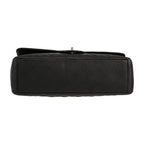 Chanel Timeless Maxi Jumbo handbag in black quilted grained leather - DETAIL 1