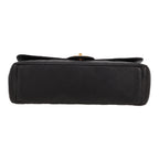 Chanel Timeless Maxi Jumbo shoulder bag in black quilted grained leather - DETAIL 1