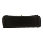 Chanel Timeless Maxi Jumbo shoulder bag in black quilted leather - DETAIL 1