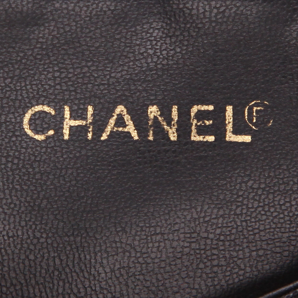 Vintage Chanel 'Shopping' handbag in raffia and black leather - DETAIL 2