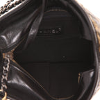 Chanel Gabrielle small shoulder bag in black and gold quilted leather and black leather - DETAIL 3
