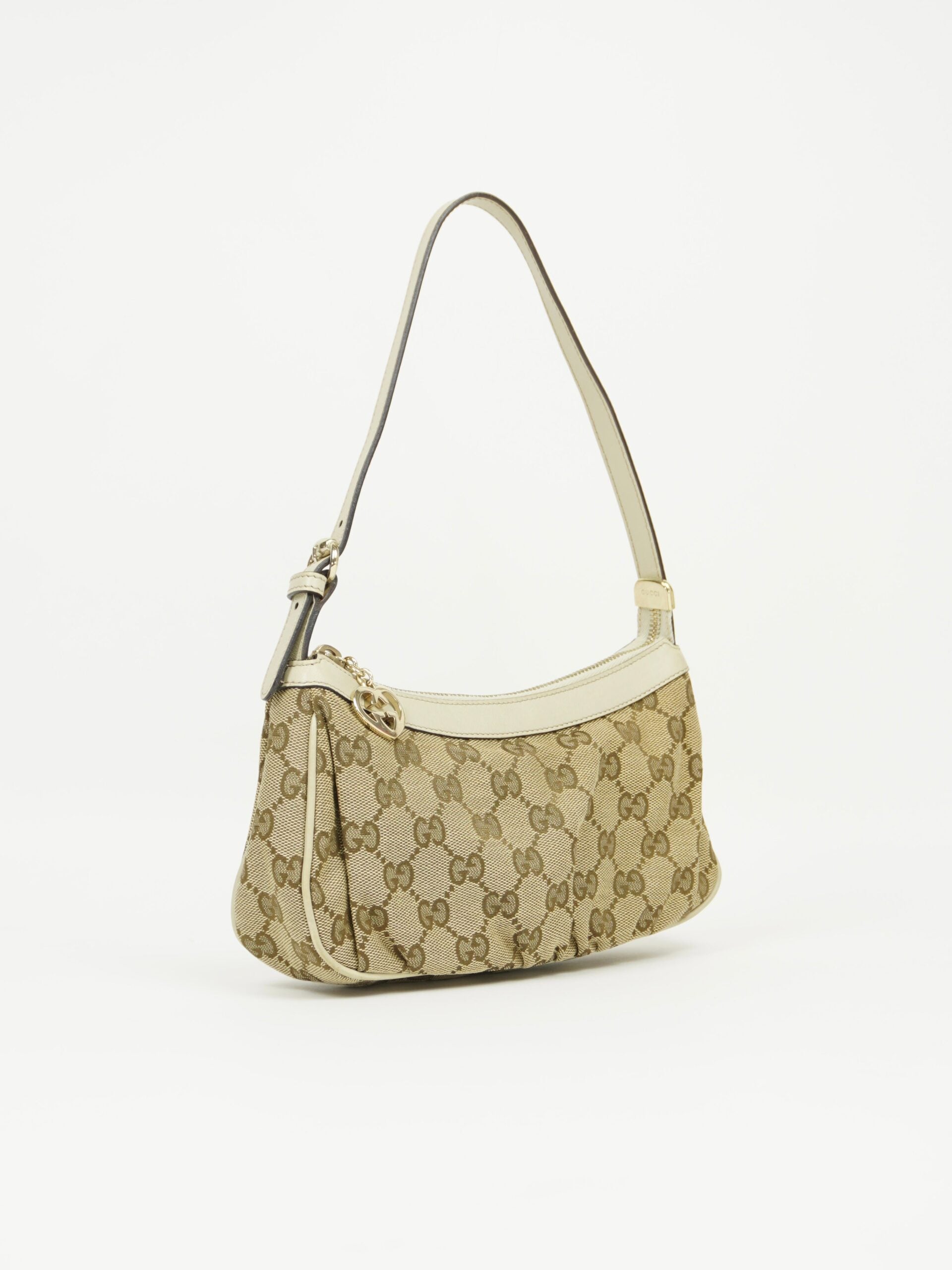 GUCCI MONOGRAM BAG WITH HEART CHARM