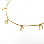 CHRISTIAN DIOR JEWELLED SPELL-OUT NECKLACE