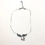 CHRISTIAN DIOR MONOGRAM WINGED NECKLACE