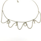 CHRISTIAN DIOR JEWELLED SPELL-OUT NECKLACE